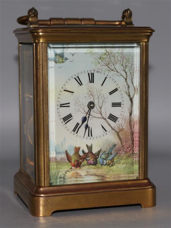 A painted porcelain dial striking carriage clock